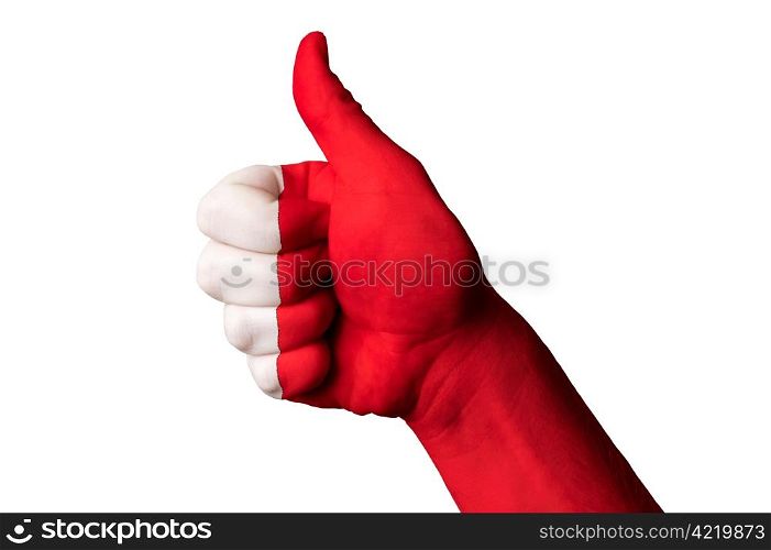 Hand with thumb up gesture in colored bahrain national flag as symbol of excellence, achievement, good, - useful for tourism and touristic advertising and also current positive political, cultural, social management of state or country