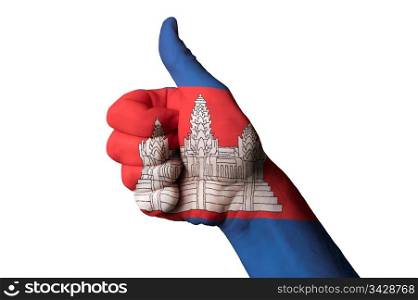 Hand with thumb up gesture in colored cambodia national flag as symbol of excellence, achievement, good, - for tourism and touristic, advertising, positive political, cultural, social management of country