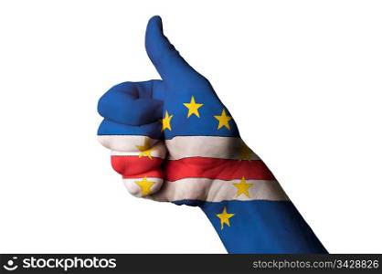 Hand with thumb up gesture in colored cape verde national flag as symbol of excellence, achievement, good, - for tourism and touristic advertising, positive political, cultural, social management of country
