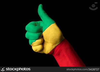 Hand with thumb up gesture in colored congo national flag as symbol of excellence, achievement, good, - for tourism and touristic advertising, positive political, cultural, social management of country