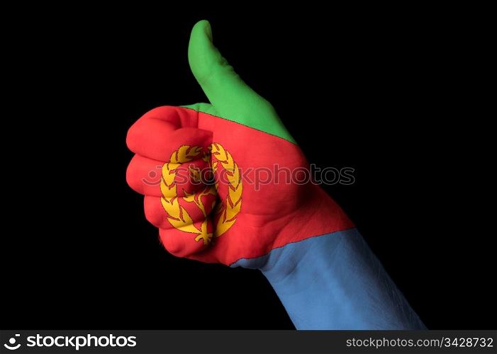 Hand with thumb up gesture in colored eritrea national flag as symbol of excellence, achievement, good, - for tourism and touristic advertising, positive political, cultural, social management of country