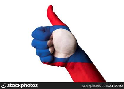Hand with thumb up gesture in colored laos national flag as symbol of excellence, achievement, good, - for tourism and touristic advertising, positive political, cultural, social management of country