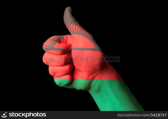 Hand with thumb up gesture in colored malawi national flag as symbol of excellence, achievement, good, - for tourism and touristic advertising, positive political, cultural, social management of country