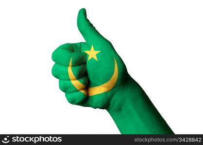 Hand with thumb up gesture in colored mauritania national flag as symbol of excellence, achievement, good, - for tourism and touristic advertising, positive political, cultural, social management of country