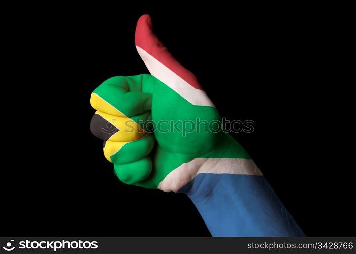Hand with thumb up gesture in colored south africa national flag as symbol of excellence, achievement, good, - for tourism and touristic advertising, positive political, cultural, social management of country