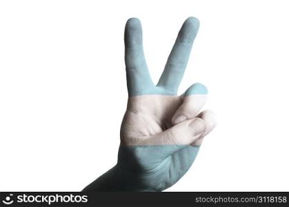 Hand with two finger up gesture in colored argentina national flag as symbol of winning, victorious, excellent, - for tourism and touristic advertising, positive political, cultural, social management of country