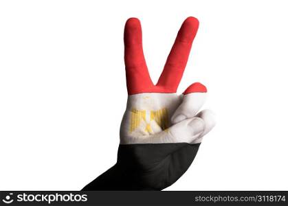 Hand with two finger up gesture in colored egypt national flag as symbol of winning, victorious, excellent, - for tourism and touristic advertising, positive political, cultural, social management of country