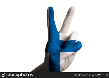 Hand with two finger up gesture in colored finland national flag as symbol of winning, victorious, excellent, - for tourism and touristic advertising, positive political, cultural, social management of country