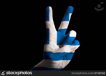 Hand with two finger up gesture in colored greece national flag as symbol of winning, victorious, excellent, - for tourism and touristic advertising, positive political, cultural, social management of country