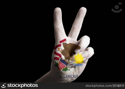 Hand with two finger up gesture in colored illinois state flag as symbol of winning, victorious, excellent, - for tourism and touristic advertising, positive political, cultural, social management of country
