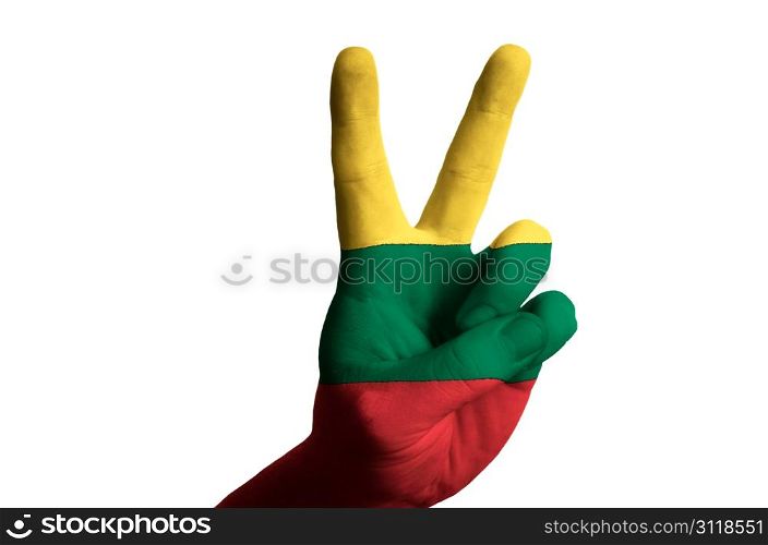 Hand with two finger up gesture in colored lithuania national flag as symbol of winning, victorious, excellent, - for tourism and touristic advertising, positive political, cultural, social management of country