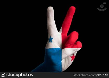 Hand with two finger up gesture in colored panama national flag as symbol of winning, victorious, excellent, - for tourism and touristic advertising, positive political, cultural, social management of country