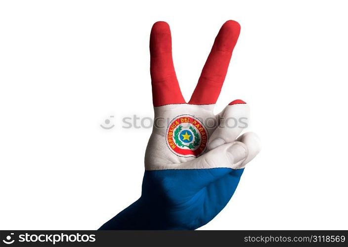Hand with two finger up gesture in colored paraguay national flag as symbol of winning, victorious, excellent, - for tourism and touristic advertising, positive political, cultural, social management of country