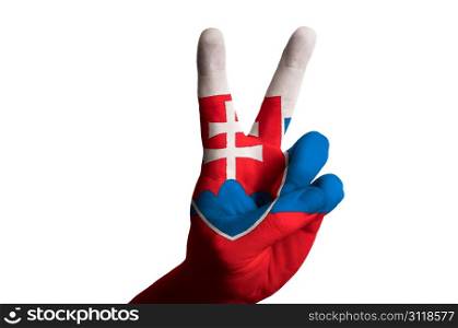 Hand with two finger up gesture in colored slovakial national flag as symbol of winning, victorious, excellent, - for tourism and touristic advertising, positive political, cultural, social management of country