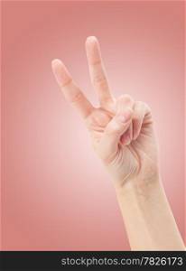 Hand with two fingers up in the peace or victory symbol. Also the sign for the letter V in sign language.