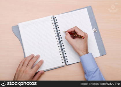 Hand writing a letter