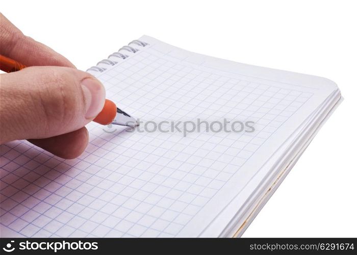 Hand writing a message in the open notebook. Isolated on white background