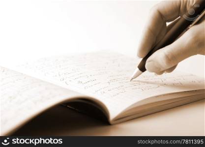 hand writing in notebook