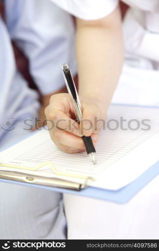 Hand writing something