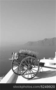 handcart in europe vacation cyclades santorini old town white and the sky