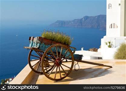 handcart in europe vacation cyclades santorini old town white and the sky