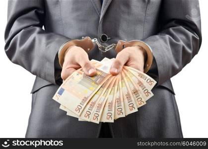 Handcuffed man with euro banknotes