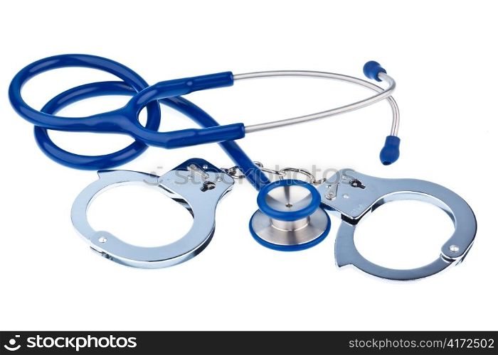 handcuffs and a stethoscope lying on a white background.