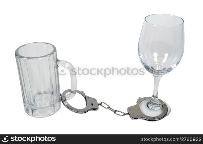 Handcuffs made of metal with mechanical clasp attached to a beer mug and wine glass - path included