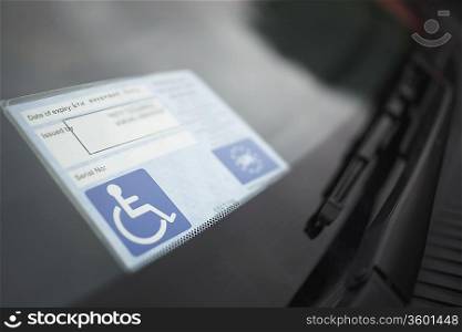 Handicap sticker on windshield