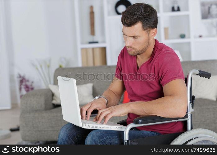 handicapped man using a laptop