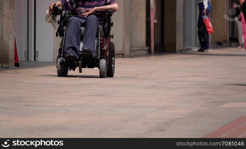 Handicapped person in a wheel chair