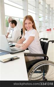 Handicapped woman in office