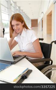 Handicapped woman in office