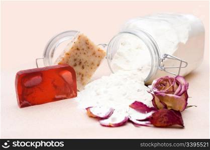 handicraft soap and jar of goat milk with natural components for bathing, shallow DOF
