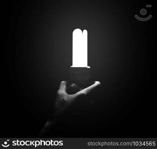 Handles light bulb on black background