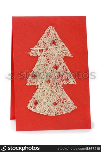 Handmade Christmas greeting card isolated on white
