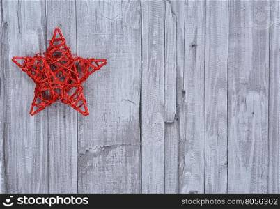 Handmade Christmas star on wooden background