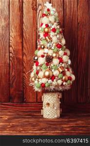 Handmade Christmas tree over wooden background, copy space. Handmade Christmas tree