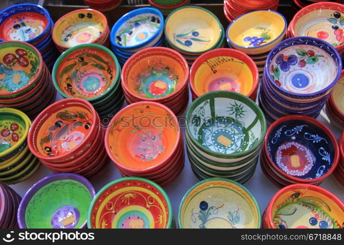 Handmade colorful pottery on a market in the Provence