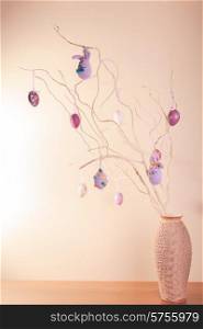 Handmade easter decorations on the branches in vase. Handmade easter decorations