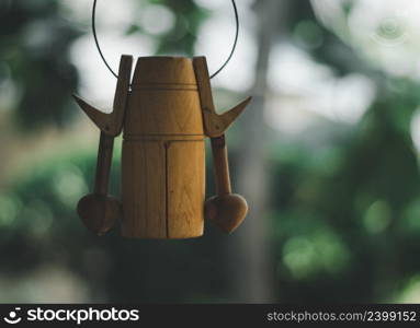 Handmade wooden bell hanging on the house&rsquo;s windows of Thailand.