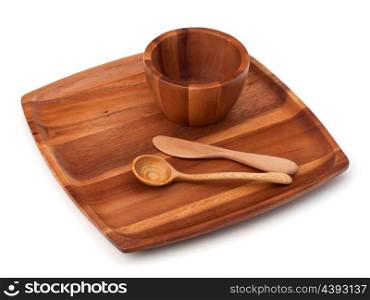 Handmade wooden kitchen dishes isolated on white background