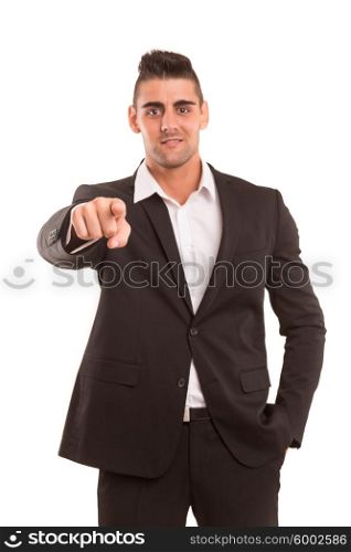 Handosome business man pointing at you, isolated over white