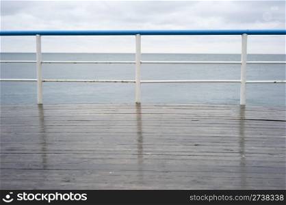 Handrail on a deck in the rainy day
