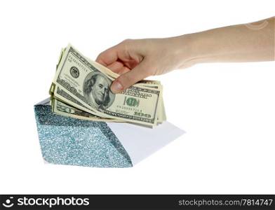 Hands and money in envelope isolated on white background