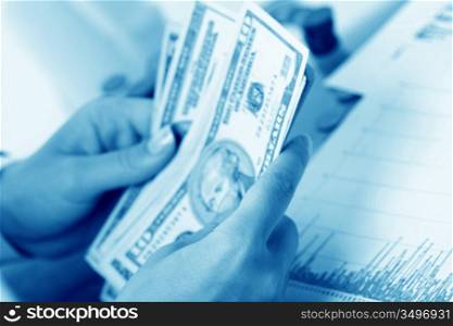 hands counting dollar money on white background