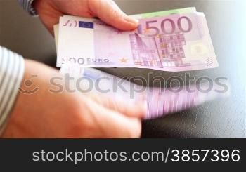 Hands counting euro money