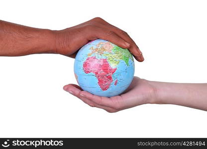 Hands cupped around a globe