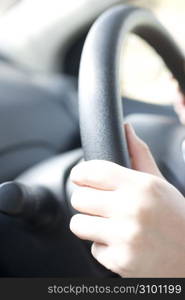 hands driving with wheel