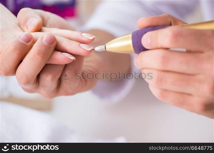 Hands during manicure care session